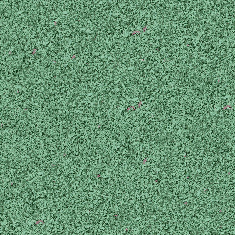 Green carpet with subtle pink specks, textured surface ready for installation.